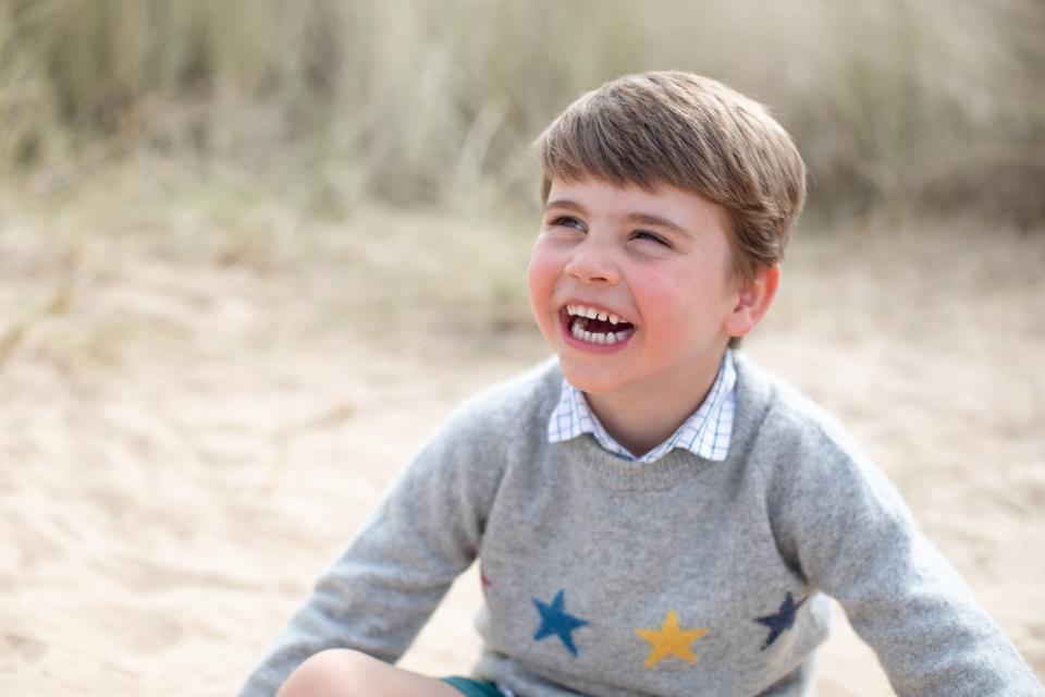 The young royal has been snapped by the Duchess of Cambridge enjoying himself in the dunes of Norfolk, which are a popular attraction for tourists who flock to the county each summer.

