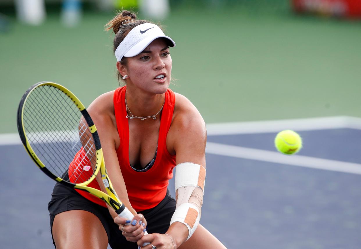 Desirae Krawczyk of Rancho Mirage returns a ball while practicing with her doubles partner at the Indian Wells Tennis Gardens, Monday, Oct. 4, 2021, in Indian Wells, Calif. 