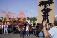 Activists march and rally at the entrance of Terminal 5 at the Port of Seattle, Washington May 18, 2015. REUTERS/Jason Redmond