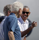 <p>Former President Barack Obama, right, jokes with formers Presidents Bill Clinton, center and George Bush, left, before the first round of the Presidents Cup at Liberty National Golf Club in Jersey City, N.J., Thursday, Sept. 28, 2017. (AP Photo/Julio Cortez) </p>