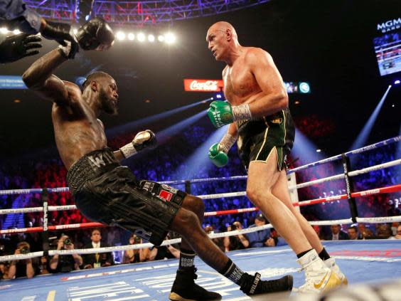 Tyson Fury stopped Deontay Wilder in the seventh round in Las Vegas (Reuters)