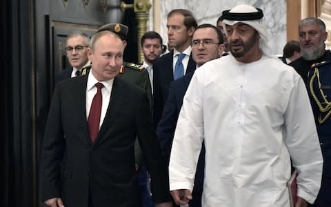 Vladimir Putin met Abu Dhabi's Crown Prince Sheikh Mohammed bin Zayed Al Nahyan on Tuesday. Donald Trump's withdrawal from Syria has greatly enhanced Russia's influence in the Middle East - Credit: ALEXEY NIKOLSKY/SPUTNIK/KREMLIN POOL/EPA-EFE/REX