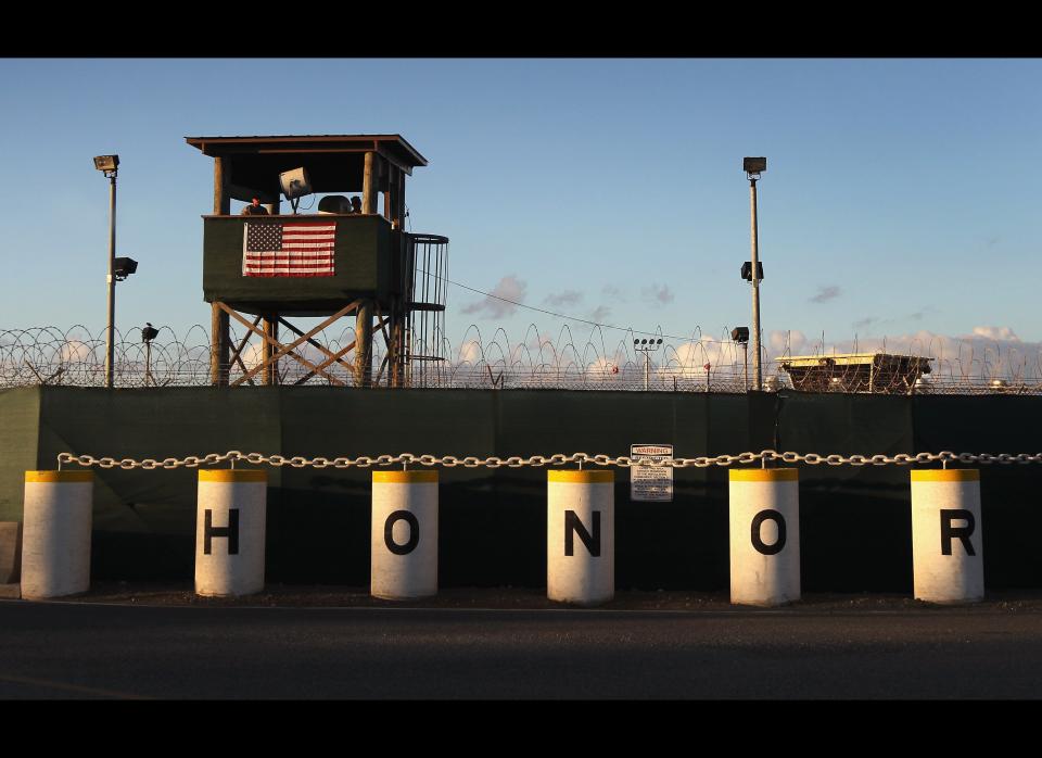 <em>Image has been reviewed by the U.S. Military prior to transmission.</em>    A U.S. military guard tower stands on the perimeter of a detainee camp at the U.S. detention center for 'enemy combatants' on September 16, 2010, in Guantanamo Bay, Cuba. With attempts by the Obama administration to close the facility stalled, some than 170 detainees remain at the detention center, which was opened by the Bush administration after the attacks of 9/11. The facility is run by Joint Task Force Guantanamo, located on the U.S. Naval Station at Guantanamo Bay on the southeastern coast of Cuba.  (John Moore/Getty Images)