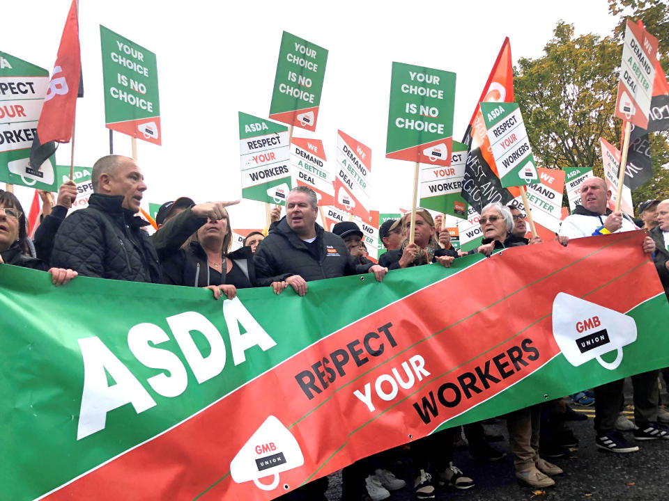 Asda workers marched through Leeds today, to Asda�s headquarters where they handed over a trolley containing a 23,000-strong petition opposing a controversial new contract.