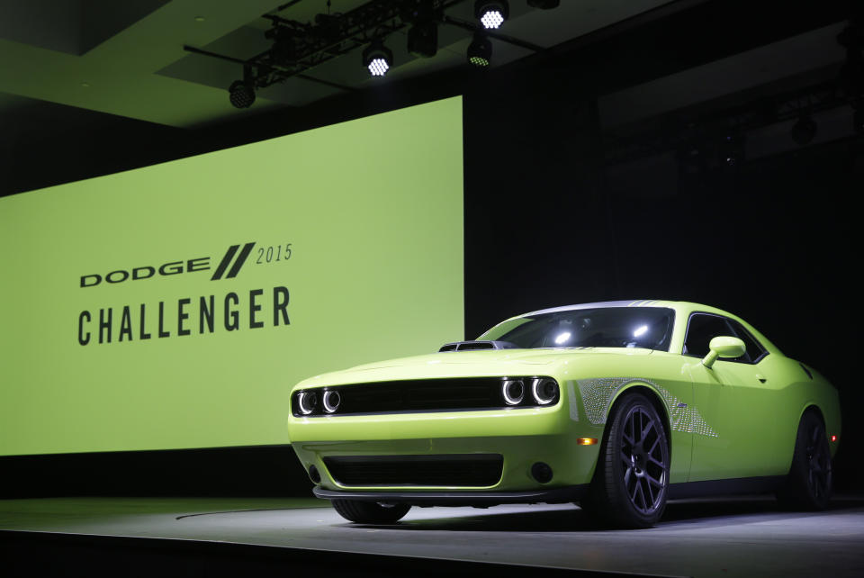 The 2015 Dodge Challenger is introduced at the New York International Auto Show in New York, Thursday, April 17, 2014. (AP Photo/Seth Wenig)