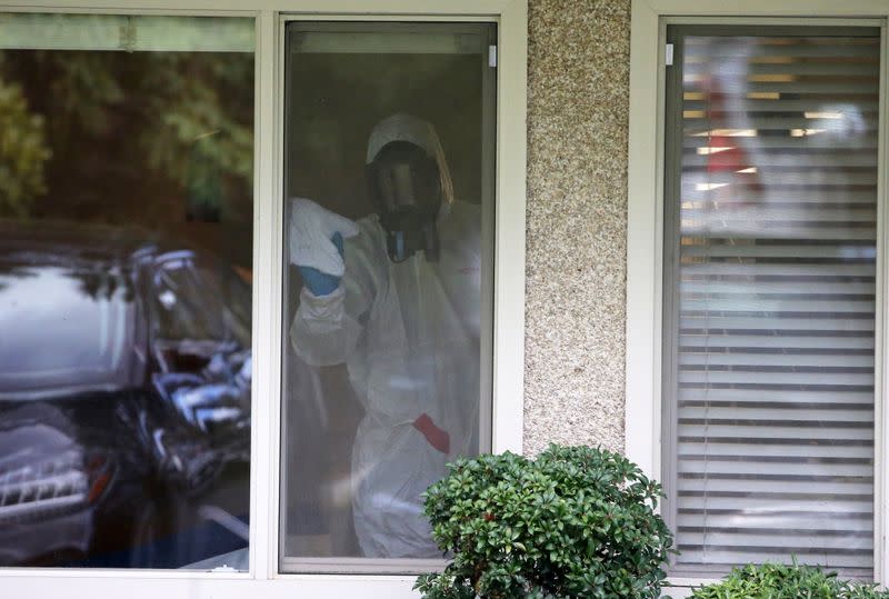 Cleaning crews from Servpro enter the Life Care Center of Kirkland in Washington