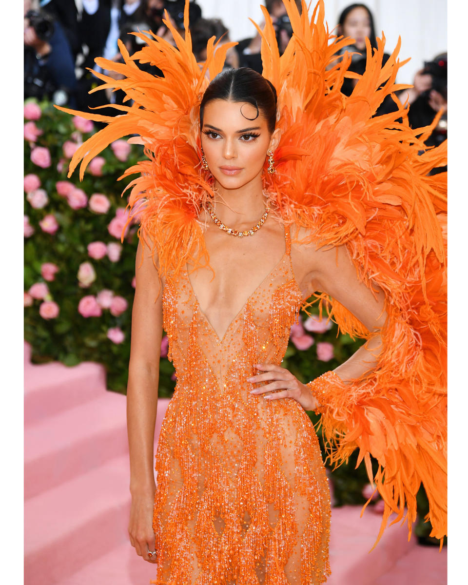 Kendall Jenner stunned on the red carpet in a hand-crafted 2019 Tiffany Blue Book Collection frame necklace featuring 19 extraordinarily beautiful imperial topaz totaling over 75 carats and over 40 radiant Tiffany white diamonds totaling over 11carats. Jenner complimented the look with 2019 Tiffany Blue Book Collection frame earrings showcasing imperial topaze of over 23 total carats and brilliant round diamonds.