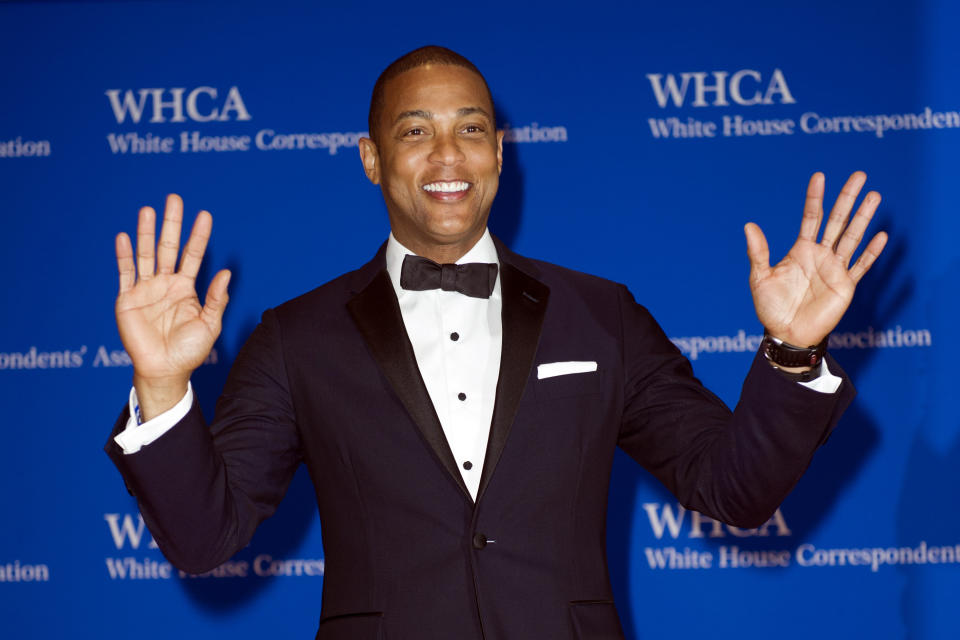 FILE - In this Saturday, April 29, 2017 file photo, CNN anchor Don Lemon waves as he arrives to the White House Correspondents' Dinner in Washington. On Friday, Nov. 9, 2018, The Associated Press has found that a photo circulating on the internet showing Lemon laughing during an apparent segment about Democrats burning flags on Election Day was fabricated. (AP Photo/Cliff Owen)