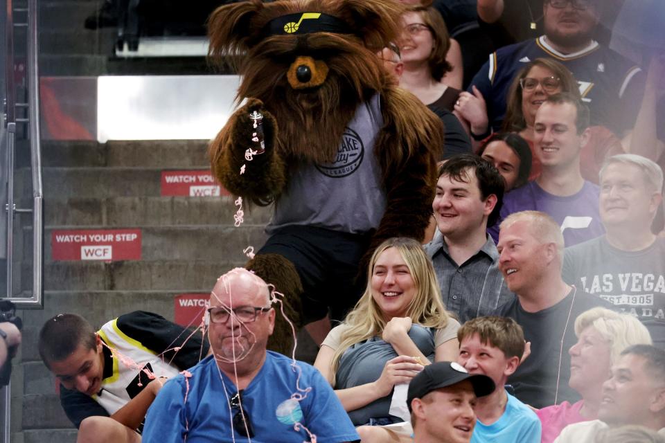 Jazz Bear terrorizes a fan with silly string as the Utah Jazz and Oklahoma City Thunder play in Summer League action at the Delta Center in Salt Lake City on Monday, July 3, 2023. | Scott G Winterton, Deseret News