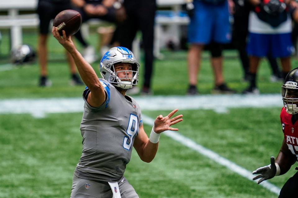 Lions quarterback Matthew Stafford passes against the Falcons during the first half at Mercedes-Benz Stadium on Sunday, Oct. 25, 2020.