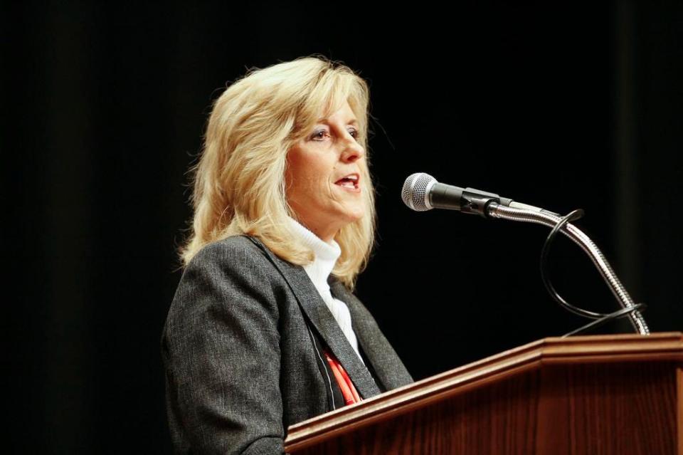 Susan Swanger, Associate Superintendent, speaks at a buncombe County mid-year graduation ceremony Saturday, Jan. 24, 2015 in the Thomas Wolfe Auditorium. She will retire from the system Aug. 1.