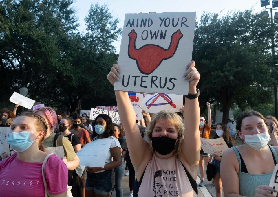 University of Texas women rally at the Texas Capitol to protest Governor Greg Abbott's signing of the nation's strictest abortion law that makes it a crime to abort a fetus after six weeks, or when a "heartbeat" is detected. Abbott signed the law Wednesday, Sept. 1st, 2021.
