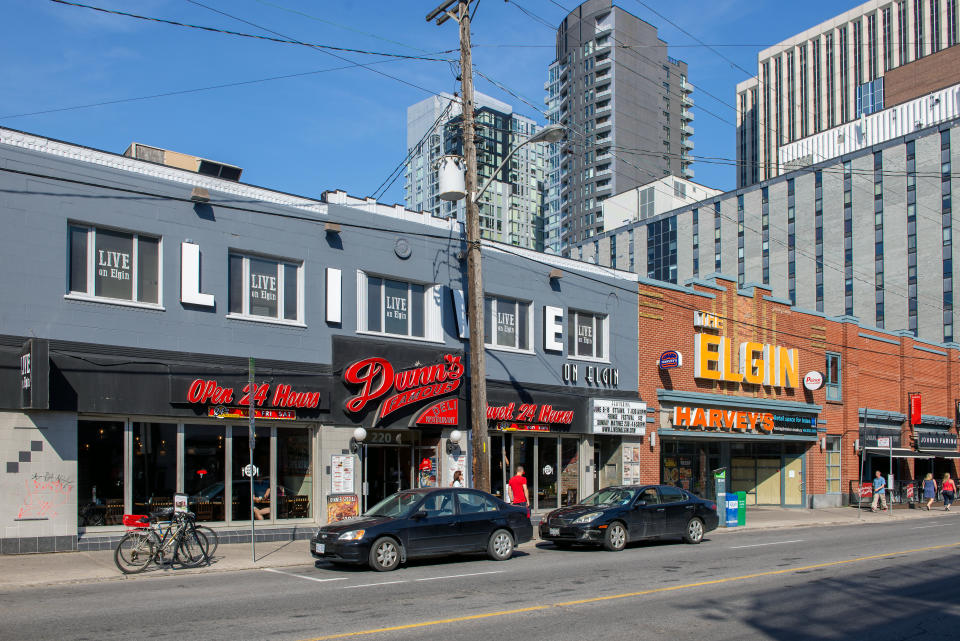 Ottawa, Canada - June 11, 2017: Elgin Street including Dunn's famous smoked meat deli, Live on Elgin music venue, Harvey"u2019s in the old theatre formerly known as the The Elgin, and Johnny Farina's Italian restaurant