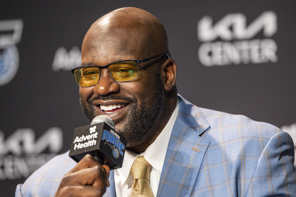 Shaquille O'Neal, speaks during a pre-game press conference about the Orlando Magic retiring his jersey before the Oklahoma City Thunder NBA basketball game, Tuesday, Feb. 13, 2024, in Orlando, Fla. (AP Photo/Kevin Kolczynski)