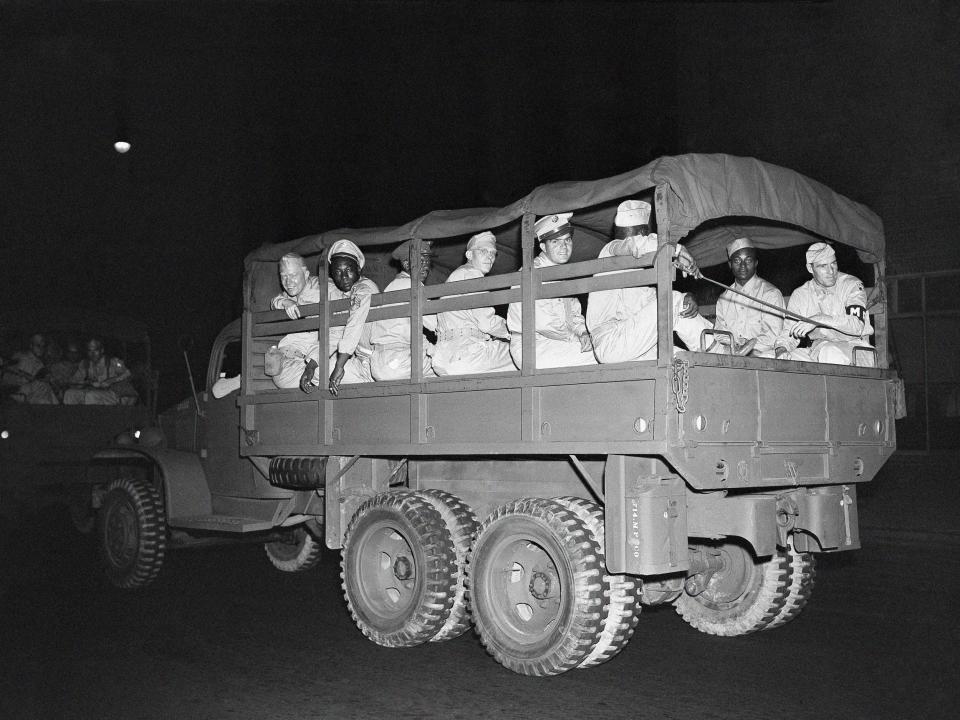 A truckload of armed troops was rushed to the Harlem disorder area