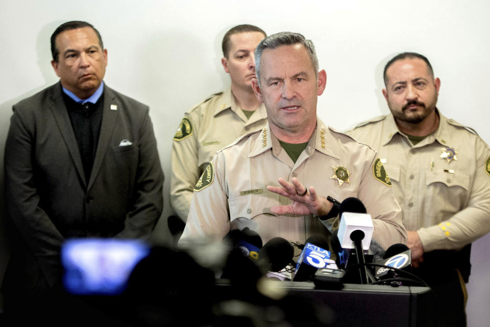 Riverside County Sheriff Chad Bianco provides update on the Perris triple homicide investigation during a news conference at the Riverside County Sheriff's Perris station on Tuesday, Feb. 18, 2020. Three adult males bodies were found yesterday at the Perris Valley Cemetery. (Watchara Phomicinda/The Orange County Register via AP)