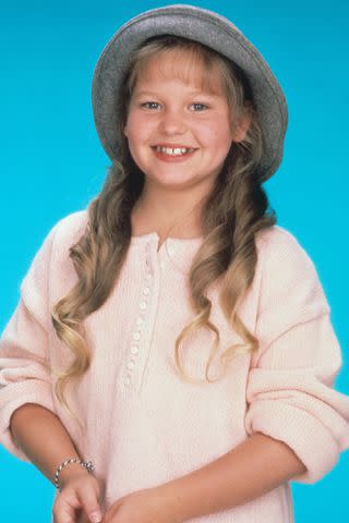 <p>Michael Ochs Archives/Getty</p> Candace Cameron Bure as a child star on "Full House"