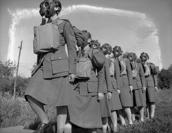 Personnel entering a gas chamber during a training exercise, No. 2 CWAC Basic Training Centre, Vermilion, Alta.