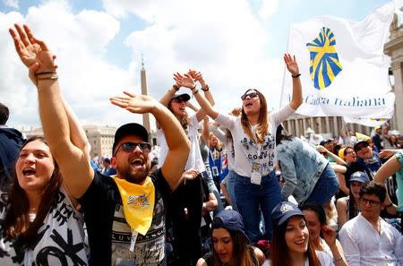 Members of Catholic Action celebrate as Pope Francis leads a special audience in St. Peter's Square at the Vatican, April 30, 2017. REUTERS/Tony Gentile