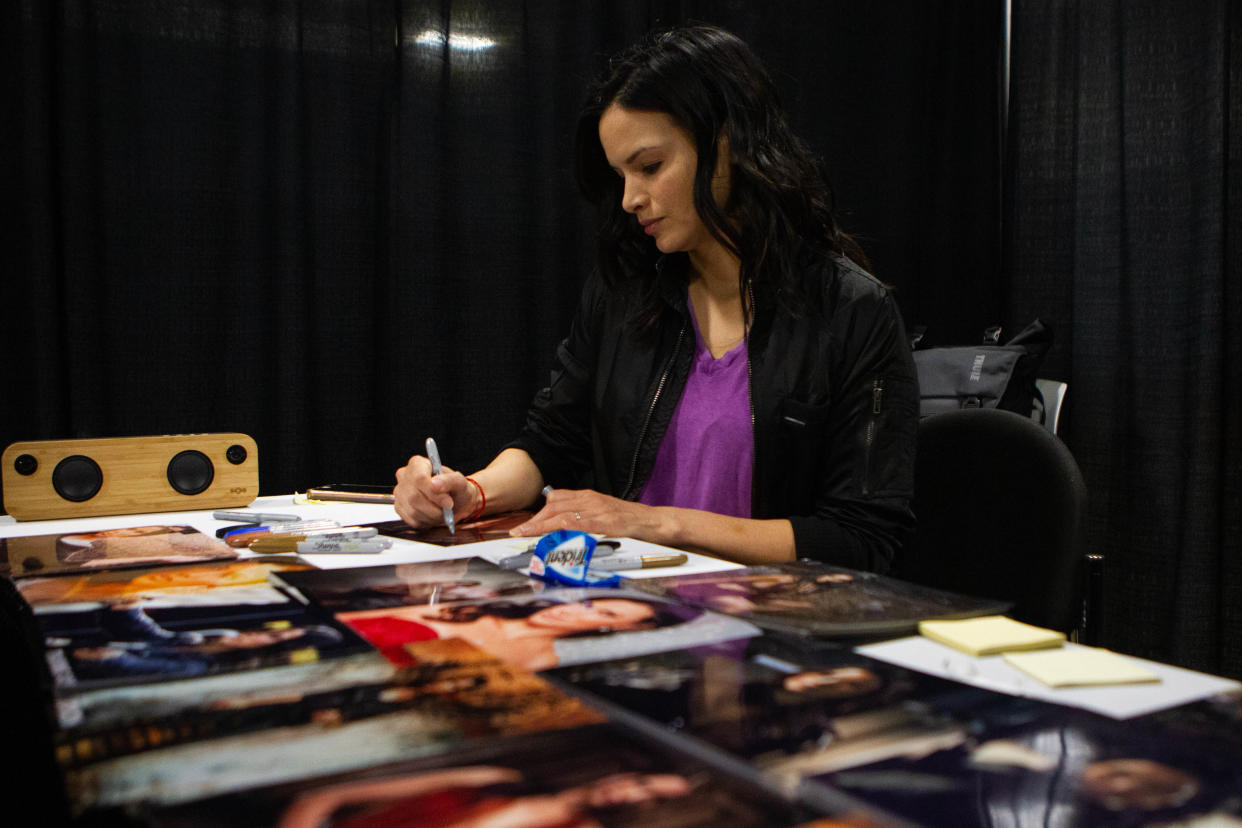Actress Katrina Law autographs a photograph for a fan at the first day of SC Comicon at the Greenville Convention Center, Saturday, March 9, 2019.
(Credit: SARAH SHERIDAN/GREENVILLE NEWS FILE PHOTO)