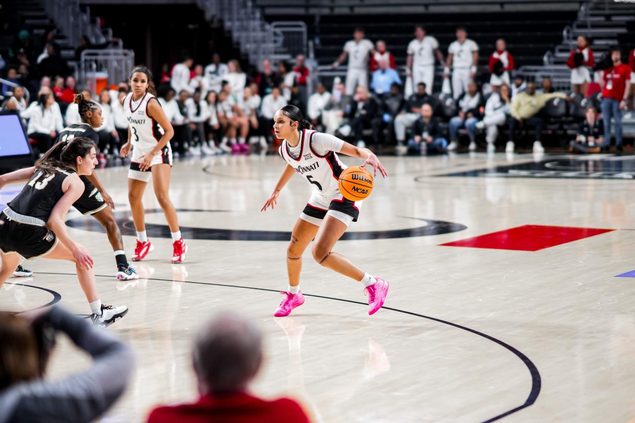 Braylyn Milton drives inside the three-point line during the Bearcats’ game against Purdue Fort Wayne. Milton had UC's lone 3-pointer, while Purdue Fort Wayne made 12 3-pointers.