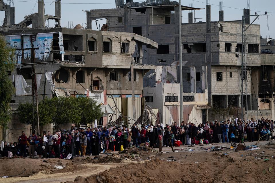 Palestinians flee to the southern Gaza Strip, on the outskirts of Gaza City, during the ongoing Israeli bombardment on Wednesday.