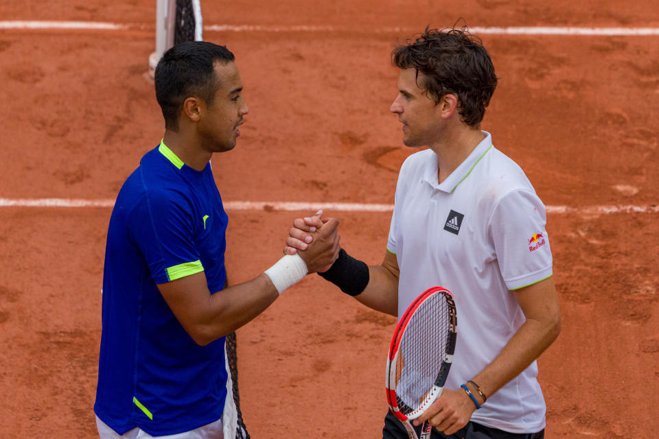 Hugo Dellien, pictured here shaking hands with Dominic Thiem after their clash at the French Open.