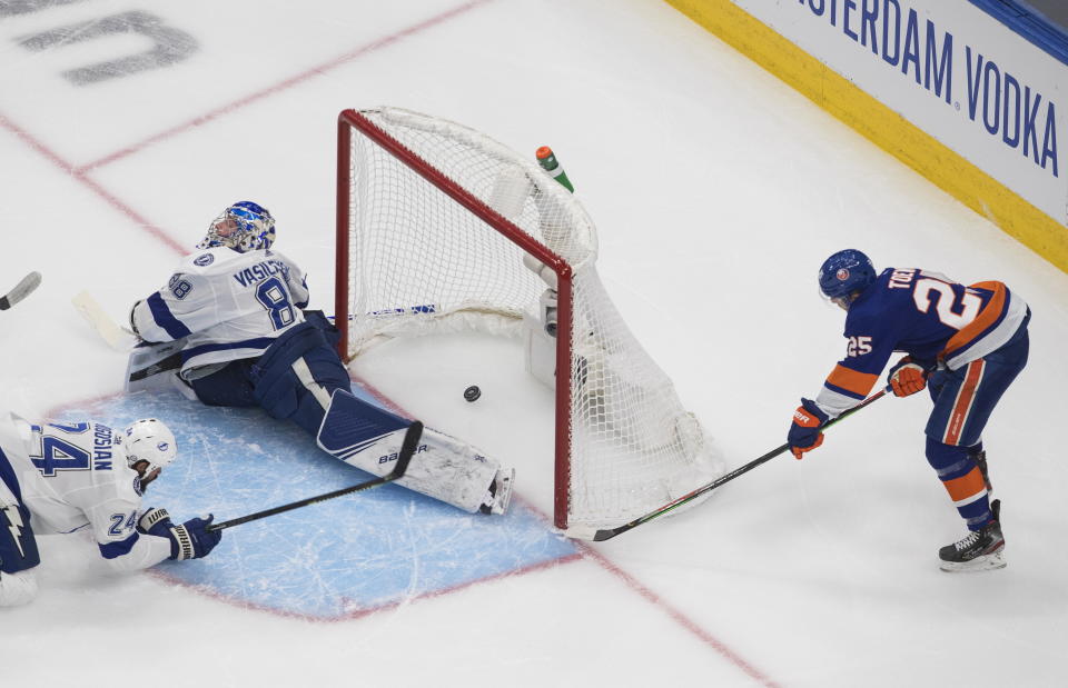 New York Islanders defenseman Devon Toews (25) scores on Tampa Bay Lightning goaltender Andrei Vasilevskiy (88) during the first period of Game 6 of the NHL hockey Eastern Conference final, Thursday, Sept. 17, 2020, in Edmonton, Alberta. (Jason Franson/The Canadian Press via AP)