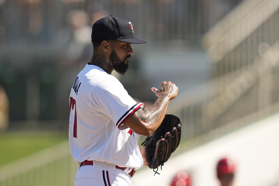 Minnesota Twins' pitcher Dennis Santana reacts after he receives a pitch clock violation in the second inning during a spring training baseball game against the Philadelphia Phillies, Wednesday, March 1, 2023, in Fort Myers, Fla. (AP Photo/Brynn Anderson)