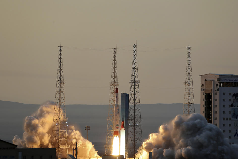 This photo released by the official website of the Iranian Defense Ministry on Thursday, Dec. 30, 2021, shows the launching of Simorgh, or "Phoenix," rocket in an undisclosed location in Iran. Iran on Thursday announced it launched a satellite carrier rocket bearing three devices into space, though it's unclear whether any of the objects entered orbit around the Earth. (Iranian Defense Ministry via AP)