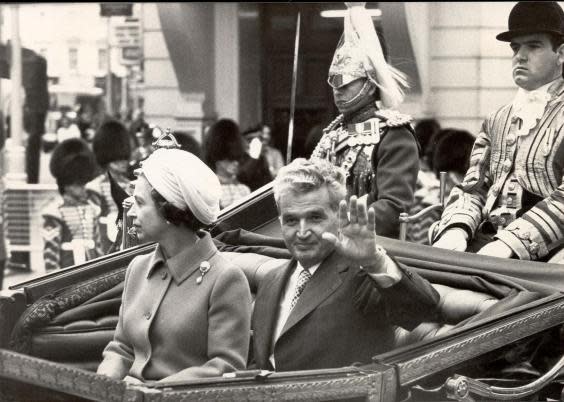 Queen Elizabeth II and Romanian leader Nicolae Ceausescu travelling to Buckingham Palace on 13 June 1978 (Evening News/Shutterstock)