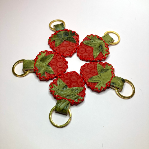Fado Made strawberry keychains.