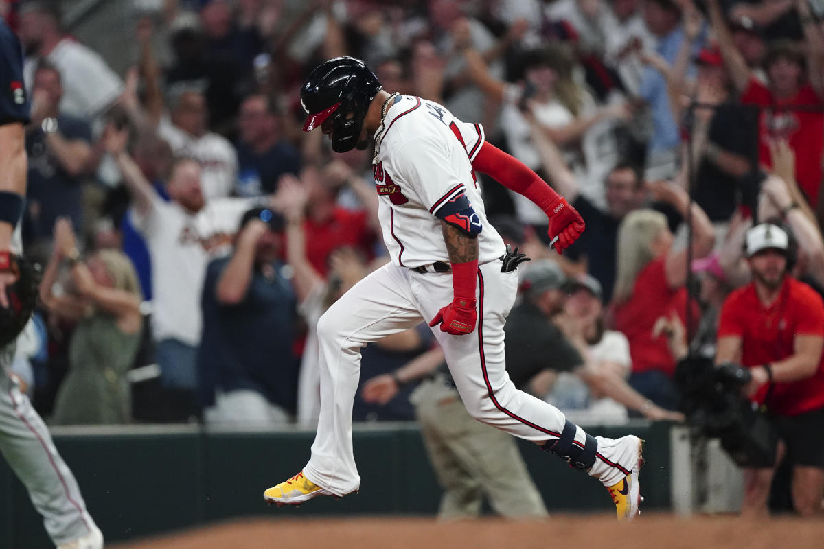 Matt Olson of the Atlanta Braves rounds first base after hitting a News  Photo - Getty Images