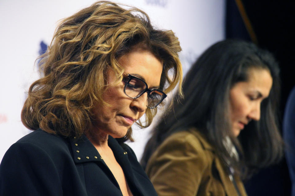 FILE - Sarah Palin, left, a Republican, is shown before a debate for Alaska's sole U.S. House seat on Oct. 26, 2022, in Anchorage, Alaska. Palin re-emerged in Alaska politics over a decade after resigning as governor with hopes of winning the state’s U.S. House seat. She had unbeatable name recognition, the backing of former President Donald Trump and an unrivaled ability to attract national media attention. But she struggled to catch fire with voters and ran what critics saw as a lackluster campaign against a breakout Democrat who pitched herself as a regular Alaskan and a Republican backed by state GOP leaders. (AP Photo/Mark Thiessen, File)