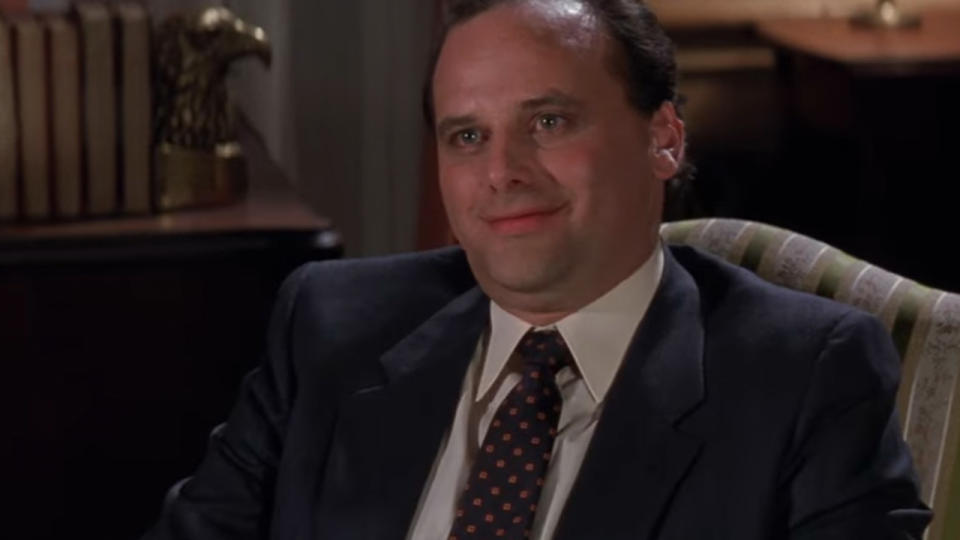 Kurt Fuller smiling, wearing a suit