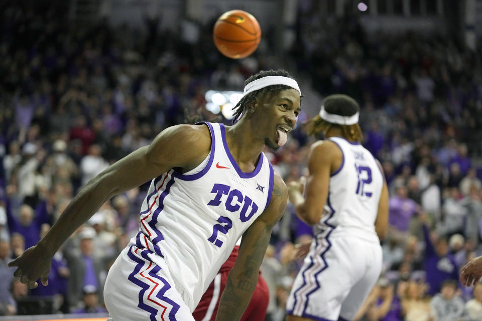 TCU forward Emanuel Miller (2) reacts to scoring a basket during the second half of an NCAA college basketball game against Oklahoma in Fort Worth, Texas, Wednesday, Jan. 10, 2024. (AP Photo/LM Otero)