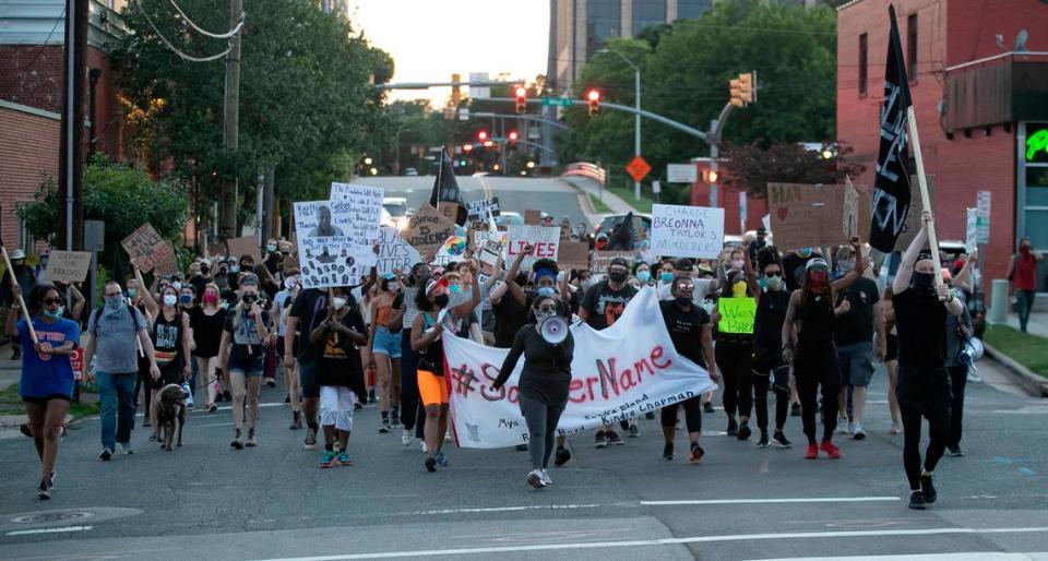 Protesters along Morgan Street on their way from Central Prison to Nash Square on Saturday, June 13, 2020 in Raleigh, N.C.