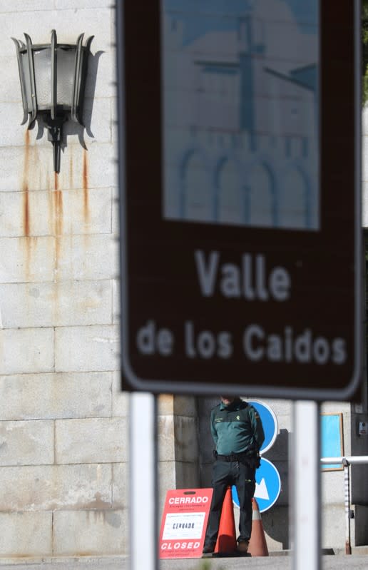A Spanish Civil Guard officer stands in the closed entrance of the Valle de los Caidos (The Valley of the Fallen), in San Lorenzo de El Escorial
