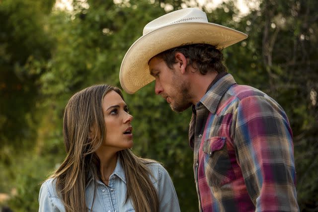 <p>Lifetime</p> Jana Kramer and Adam Senn in 'A Cowboy Christmas Romance'