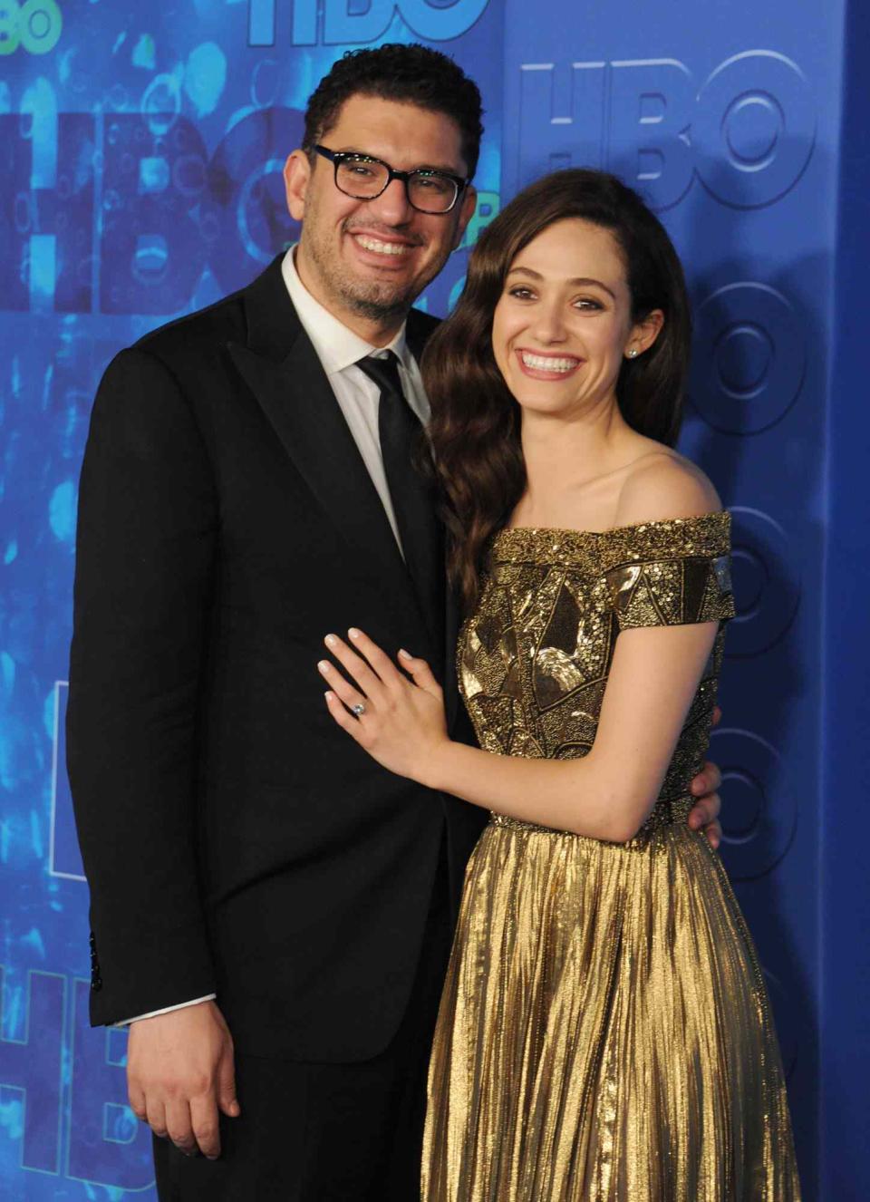 <p>The <i>Phantom of the Opera</i> actress <a href="https://people.com/parents/emmy-rossum-welcomes-baby-girl-with-husband-sam-esmail/" rel="nofollow noopener" target="_blank" data-ylk="slk:welcomed her first child;elm:context_link;itc:0;sec:content-canvas" class="link ">welcomed her first child</a>, a baby girl, with husband <a href="https://people.com/celebrity/emmy-rossum-sam-esmail-honeymoon-rwanda/" rel="nofollow noopener" target="_blank" data-ylk="slk:Sam Esmail;elm:context_link;itc:0;sec:content-canvas" class="link ">Sam Esmail</a> on May 24, she announced on <a href="https://www.instagram.com/p/CPUPQqNF7xC/" rel="nofollow noopener" target="_blank" data-ylk="slk:Instagram;elm:context_link;itc:0;sec:content-canvas" class="link ">Instagram</a>.</p> <p>Rossum announced the exciting news alongside two black-and-white maternity shots. One featured the <i>Shameless</i> alum showing off her baby bump, while the other showed Esmail cradling her belly. She also included a photo of what appears to be the newborn's footprint. </p> <p>"5.24.21," the new mom captioned the post. "On a sunny Monday morning, at 8:13AM, we welcomed our daughter into the world."</p>