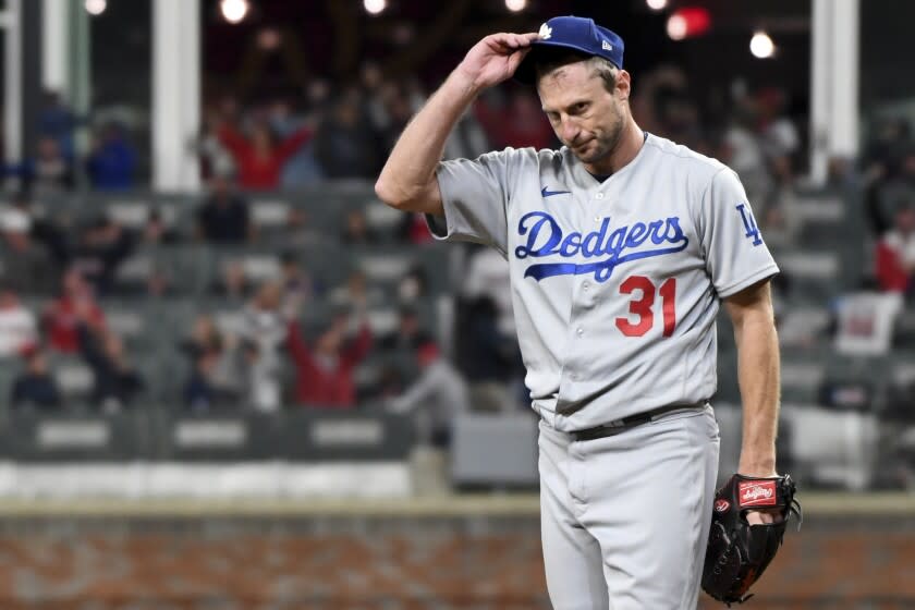 Atlanta, GA - October 17: Los Angeles Dodgers starting pitcher Max Scherzer reacts while Atlanta Braves' Joc Pederson.