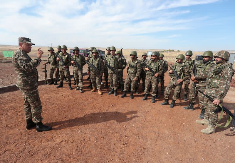 Armenian reservists undergo training at a firing range near Yerevan