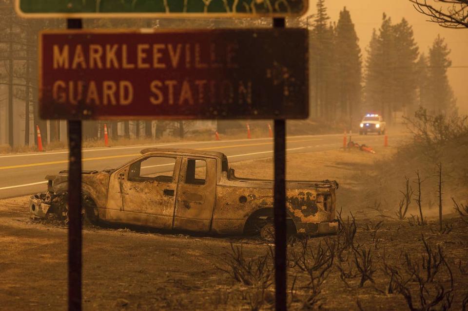 A scorched car rests on a roadside in Alpine County, California, on July 17.