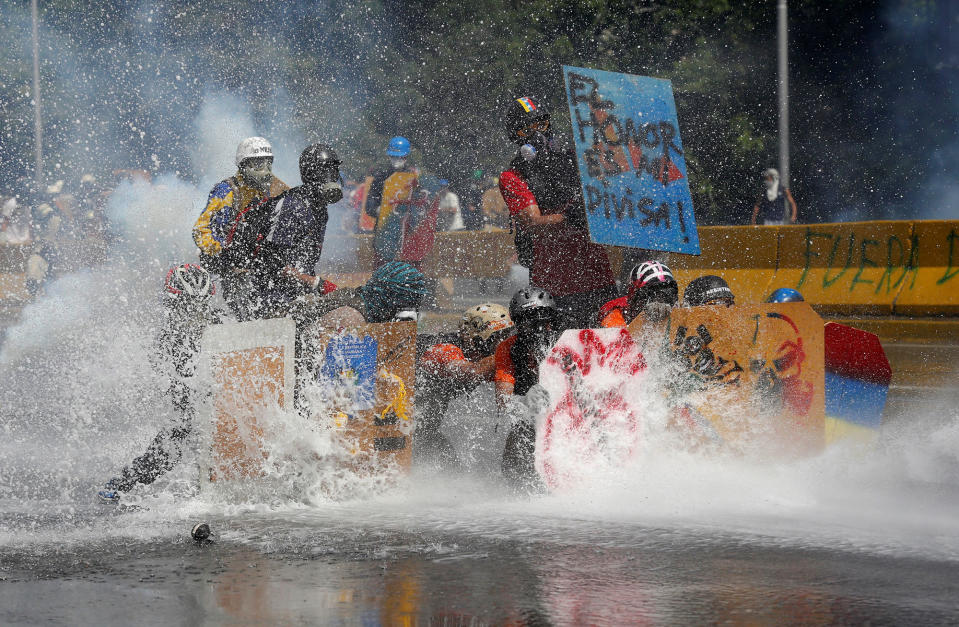 Water cannons blast Venezuelan protesters