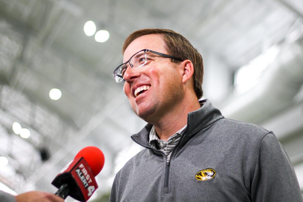 Missouri Tigers head coach Eliah Drinkwitz laughs during an interview post press conference on April 26, 2024 inside Stephens Indoor Facility in Columbia, Mo.
