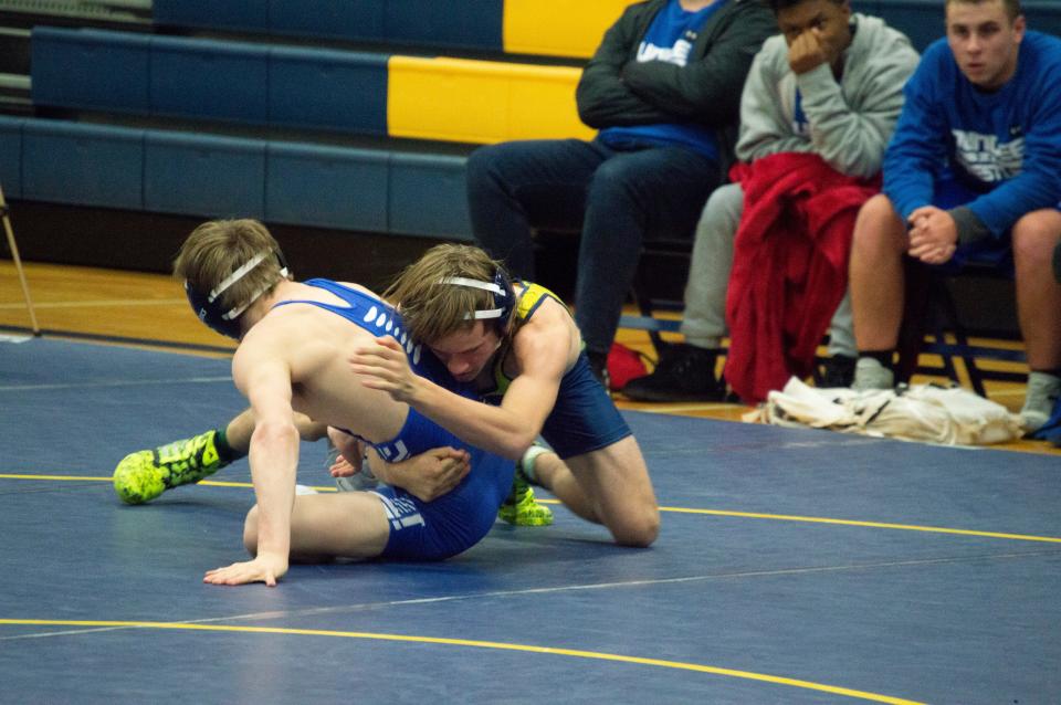 Hillsdale's Levi Smith battles a Dundee opponent.