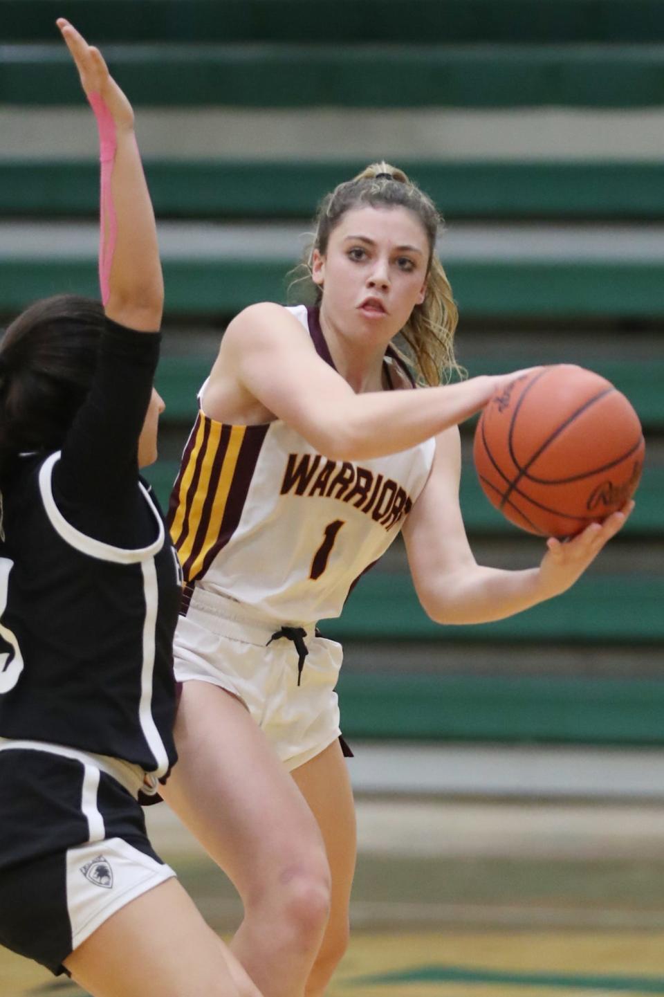 Walsh Jesuit's Cesily Sutton looks to pass against Excel Hoops in the Ohio vs. Ontario Classic at St. Vincent- St. Mary's High School on Dec. 3, 2022, in Akron.