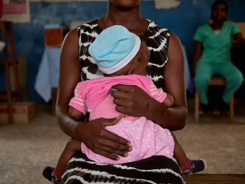 Bea, 18, from Monrovia, Liberia, gave birth to her daughter three months ago - Credit: Francesco Brembati