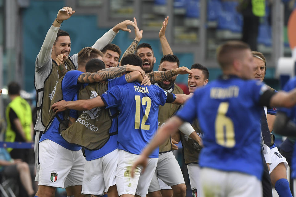 Italy's Matteo Pessina (12) celebrates after scoring his side's opening goal during the Euro 2020 soccer championship group A match between Italy and Wales at the Stadio Olimpico stadium in Rome, Sunday, June 20, 2021. (Alberto Lingria/Pool via AP)