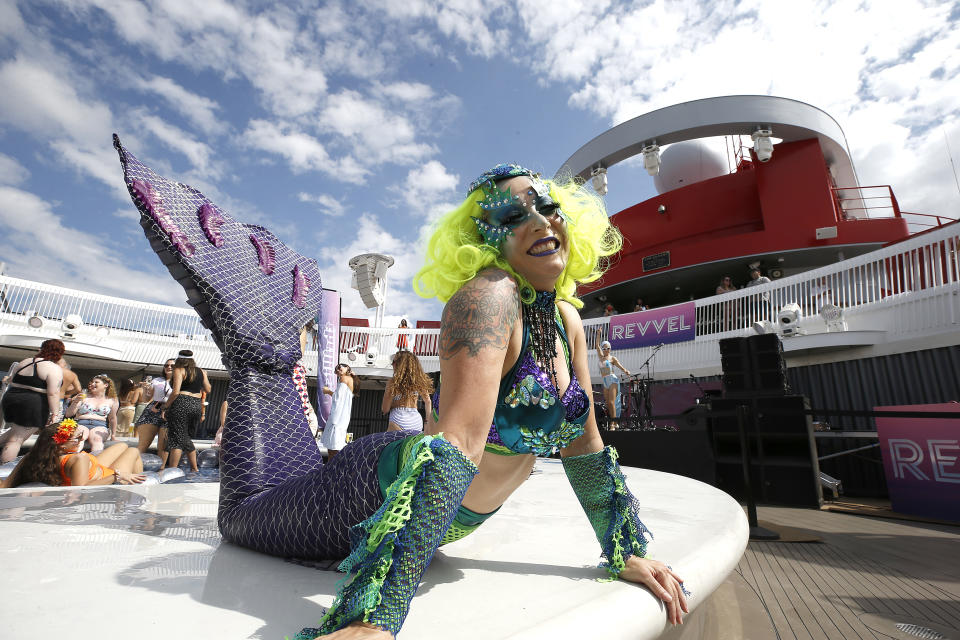 NEW YORK, NEW YORK - SEPTEMBER 18: A dancers performs during a pool party at Revvel Festival onboard Virgin's Scarlet Lady cruise ship at Pier 88 on September 18, 2021 in New York City. (Photo by John Lamparski/Getty Images)